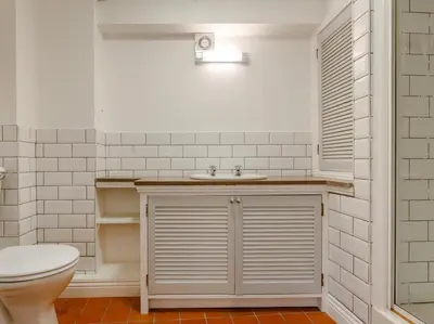a bathroom with a toilet and a sink at 2 Bed in Penryn oc-78620 in Penryn