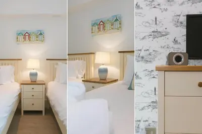 three images of a bedroom with two beds and a tv at Number One Peninsula in St Ives