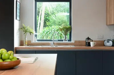 a kitchen with a sink and a window at Beachside in Newquay