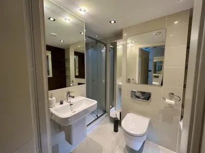 a bathroom with a sink and a toilet at Newquay Rocklands Beach View in Newquay