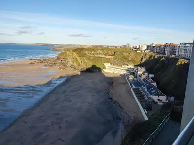an aerial view of a beach and the ocean at Newquay Rocklands Beach View in Newquay