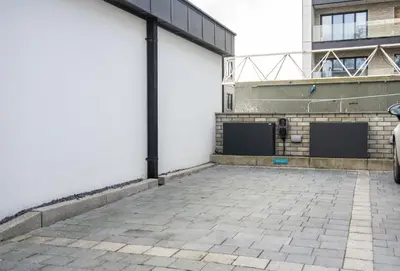 an empty parking lot in front of a building at 1 Cliff Edge in Newquay in Newquay