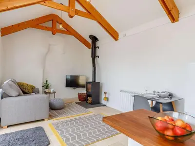 a living room with a bowl of fruit on a table at 1 Bed in Redruth oc-85826 in Gwennap