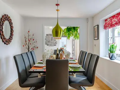 a dining room with a table and chairs at 5 Bed in Redruth oc-65745 in Gwennap