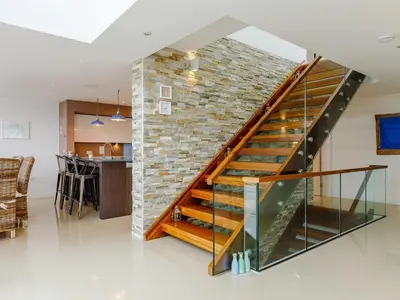 a brick wall with a staircase in a house at 5 Bed in Fowey oc-77657 in Polruan