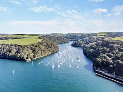an aerial view of a river with boats at 3 Bed in Polruan oc-83821 in Fowey