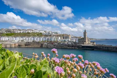 a view of a city with flowers in the foreground at Porthleven B and B in Helston