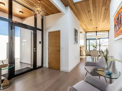 a living room with a wooden ceiling and a glass table at 3 Bed in South Tehidy oc-90549 in Camborne