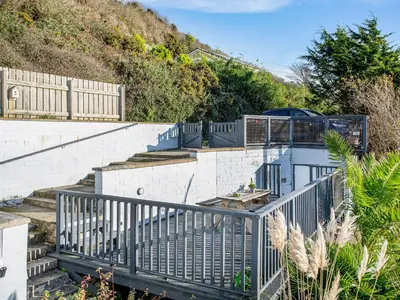 a set of stairs leading up to a house at Lookout in Downderry