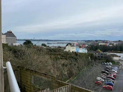 a bunch of cars parked in a parking lot at Seascape Stay No 4, Sea View & Parking in Falmouth