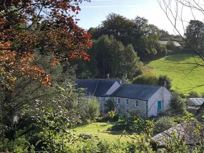 an old house on the side of a hill at Exceptional retreat near Cornwall Coast in Tywardreath