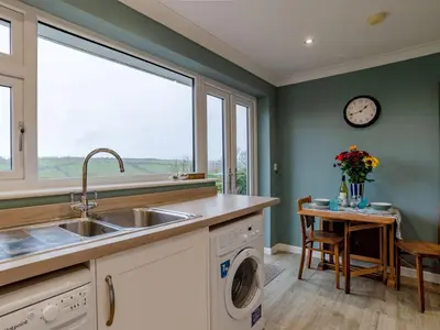 a kitchen with a sink and a window at Holiday Home Valley View by Interhome in Mevagissey