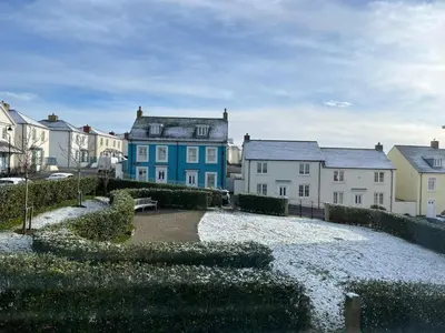 a group of houses with a blue house at 3 Bed in Newquay oc-47630 in Newquay