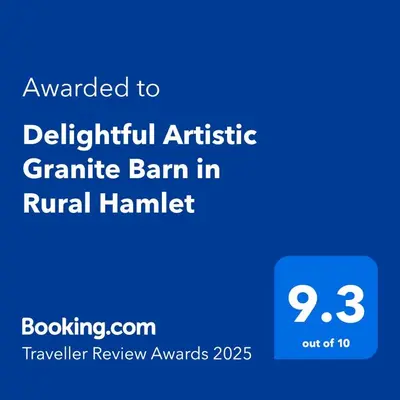 a blue sign with the text awarded to platinum artistic genetic barn in renal hamlet at The Artists Barn in Launceston