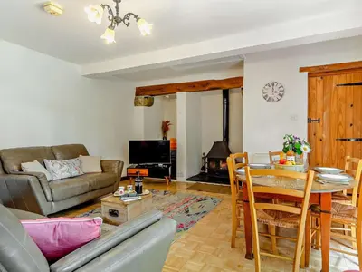 a living room with a couch and a table at 2 Bed in Launceston oc-02036 in North Petherwin