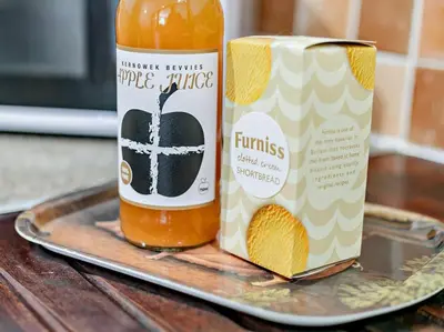 a bottle of pumpkin sauce next to a can of pumpkin sauce at 2 Bed in Launceston oc-02038 in North Petherwin