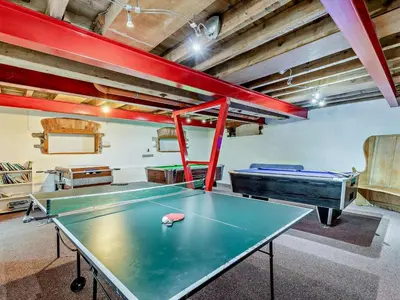 a ping pong table in a room with two pool tables at 2 Bed in Launceston oc-02033 in North Petherwin