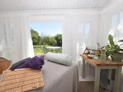 a room with a bed and a table and a window at 2 Bed in Callington oc-tyler in North Hill