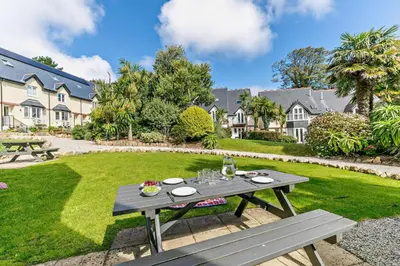 a picnic table in the garden of a house at 2 Bed in St. Ives oc-92928 in Carbis Bay