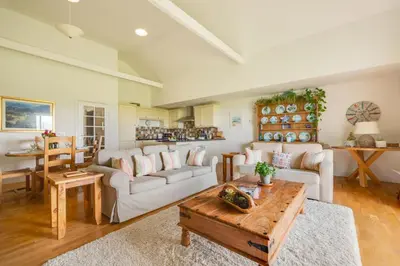 a living room with two couches and a table at 2 Bed in Wadebridge oc-p00374 in Wadebridge