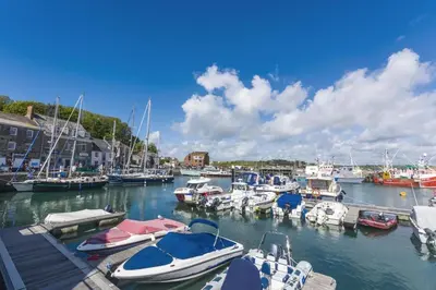 a bunch of boats docked in a harbor at 2 Bed in Wadebridge oc-p00374 in Wadebridge