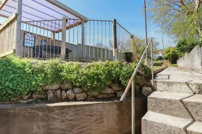 a set of stairs leading up to a building at Eden Retreat in Par