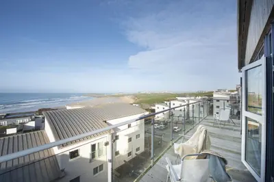 a view of the ocean from the balcony of a building at The Penthouse Forty Eight, Ocean 1 in Newquay