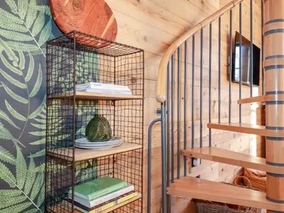 a bird cage in a tiny house at Little Beach Cabin in Newquay