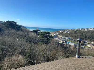 a view of the ocean from the top of a hill at Cliffside 3 Bedroom House with Sea Views in Portreath
