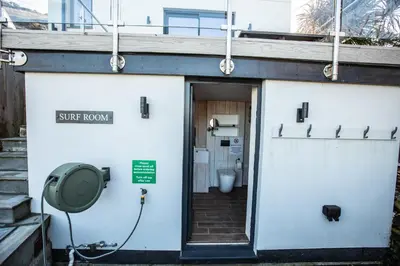 a building with a bathroom with a toilet at THE ANNEXE AT UPPER BEACH HOUSE in Portreath