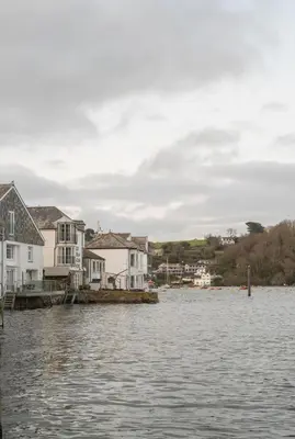 a view of a body of water with houses at The King Of Prussia in Fowey