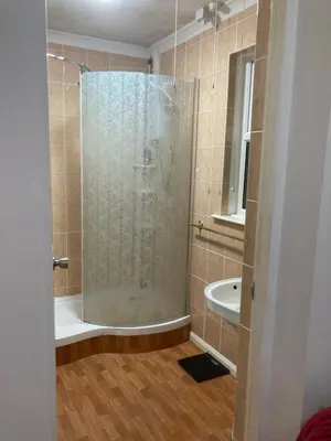 a bathroom with a shower and a sink at Little Haven in Launceston