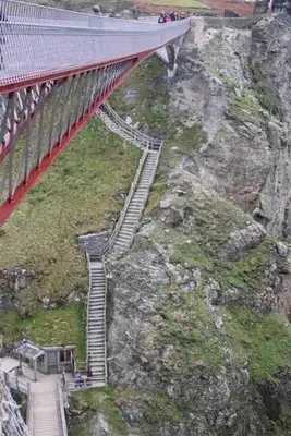 a bridge over a mountain with a train on it at Secluded Luxury Pod with Hot Tub in Launceston