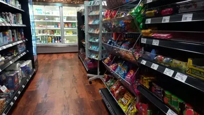 a store aisle filled with lots of different types of food at Three bed Holiday Home in Hayle