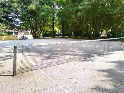 a tennis net on the side of a street at Three bed Holiday Home in Hayle