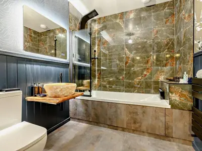 a bathroom with a tub and a sink at 3 Bed in Newquay oc-90068 in Newquay
