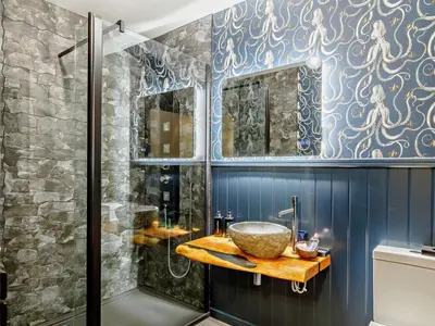 a bathroom with a sink and a shower at 4 Bed in Newquay oc-90069 in Newquay