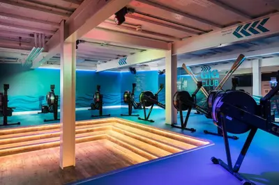 a gym with treadmills and exercise equipment in a room at St Michaels Resort, Falmouth in Falmouth