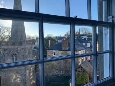 a view of the tower from a window at St Agnes Hotel in St. Agnes