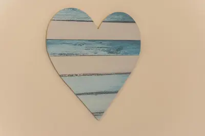 a heart shaped mirror with a picture of the ocean at 2 Bed in St. Ives oc-s28155 in St Ives