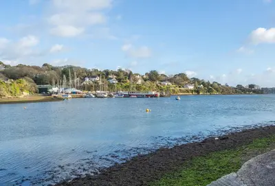 a large body of water with boats in it at Roseland Cottage in Truro