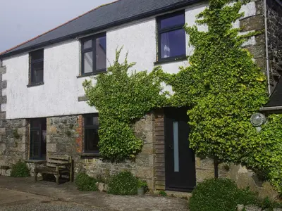 a house with ivy growing on the side of it at The Bower in Helston