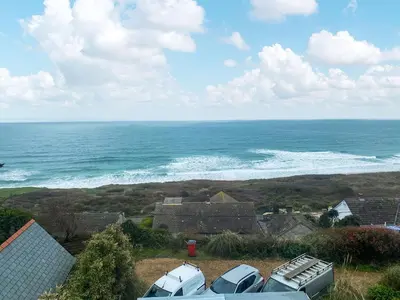 a view of the ocean from a house at Trebellan in Porthtowan