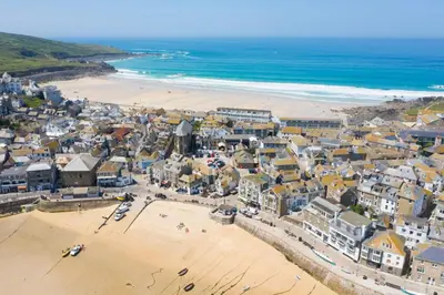 an aerial view of a beach with houses and the ocean at 3 Bed in Germoe oc-w29163 in Germoe