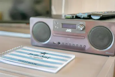 a purple radio sitting on top of a table at 3 Bed in St. Merryn oc-l29062 in St Merryn