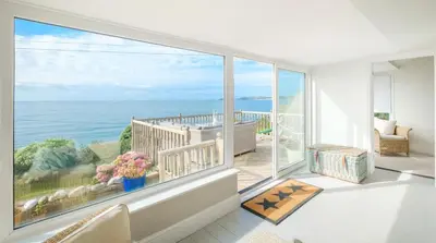 a room with a large window with a view of the ocean at 2 Bed in Downderry oc-p29018 in Downderry