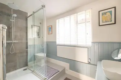 a bathroom with a shower and a sink at 2 Bed in Downderry oc-p29018 in Downderry