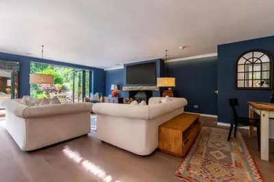 a living room with two couches and a tv at 5 Bed in Little Petherick oc-s29057 in Little Petherick