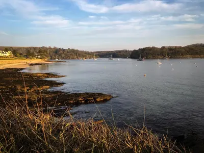 a large body of water with boats in it at Elerkey Guest House in Veryan