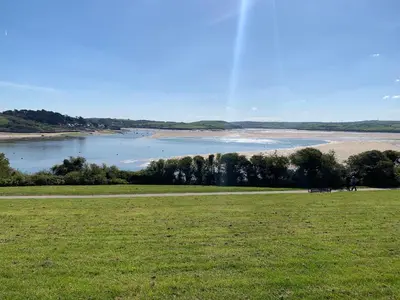 a park with a view of a body of water at 2 Boathouse Terrace in Wadebridge